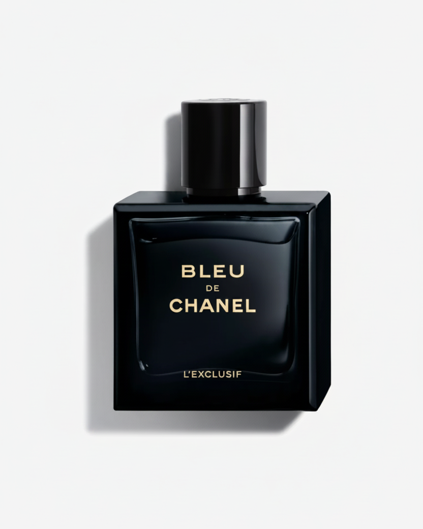 Chanel Bleu de Chanel L'Exclusif fragrance bottle in a glossy black rectangular glass bottle with gold lettering, set against a plain white background with a soft shadow.