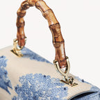 Aspinal of London Midi Mayfair® Top Handle Bag – Sky Blue Toile De Jouy Hand Embroidery on Ivory Canvas Raffia