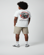 White short-sleeve T-shirt shown from the back, featuring a large circular anime graphic with multiple characters inside a red circle and Japanese text below, on a light gray background.