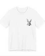 A white short-sleeve crewneck t-shirt with a small black line-art graphic of a rabbit head holding a cigarette on the left chest, displayed on a clean white background.