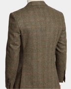 Back view of a men's tweed blazer in brown and beige with a subtle red windowpane check pattern, displayed on a mannequin against a light gray background.