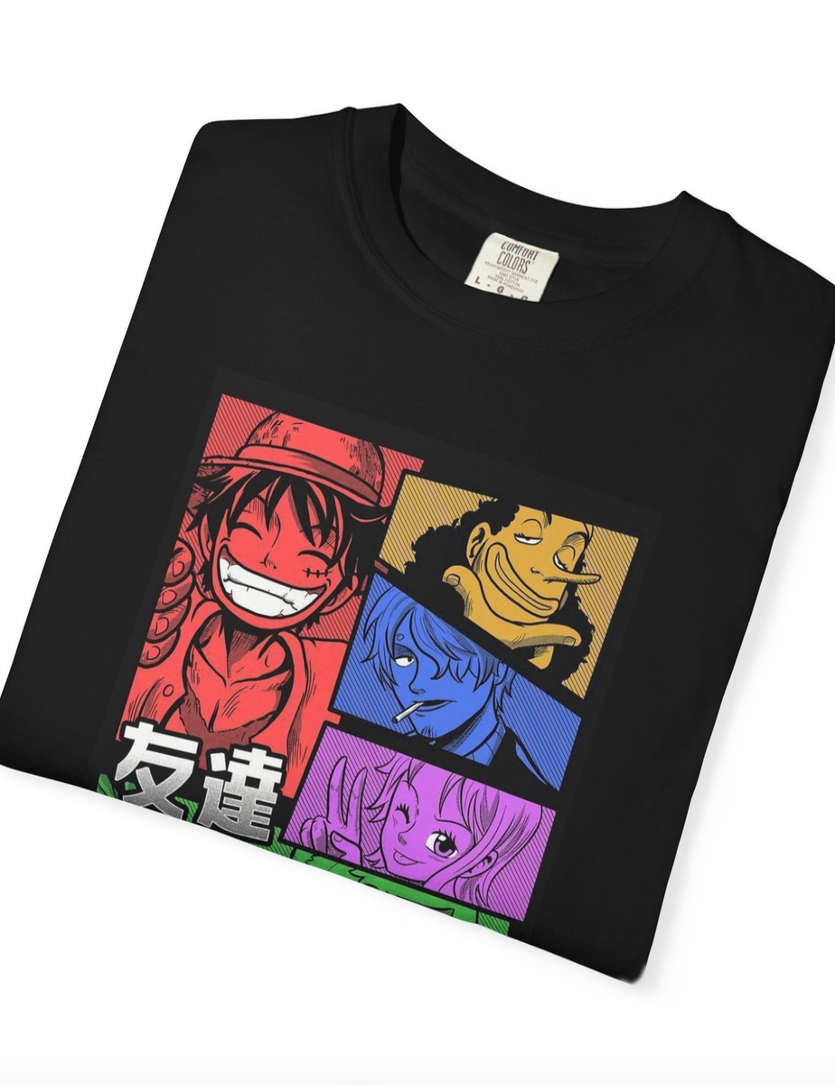 A folded black short-sleeve t-shirt with a colorful graphic print of anime characters from One Piece, displayed on a clean white background.