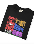 A folded black short-sleeve t-shirt with a colorful graphic print of anime characters from One Piece, displayed on a clean white background.