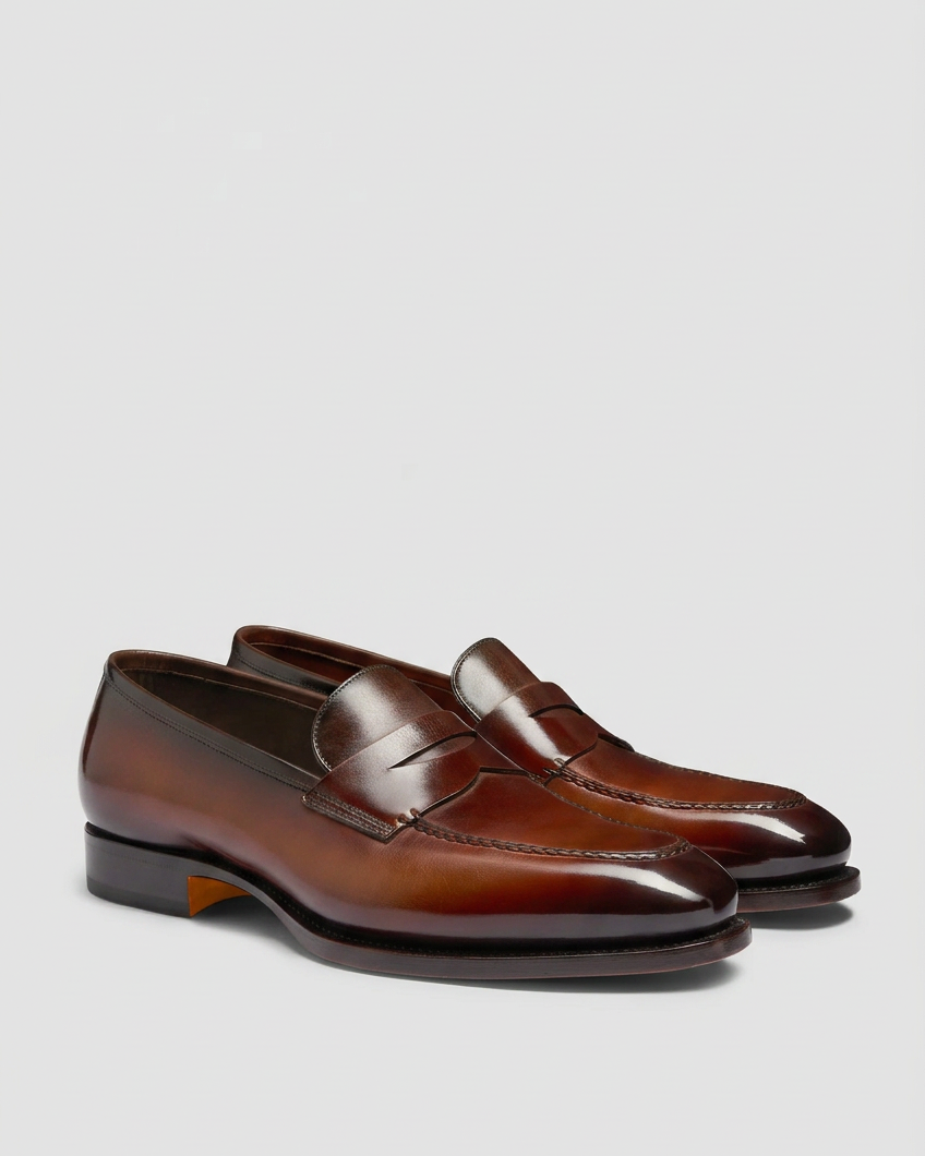 Brown loafer pair swapped onto the grey background at the original ground level