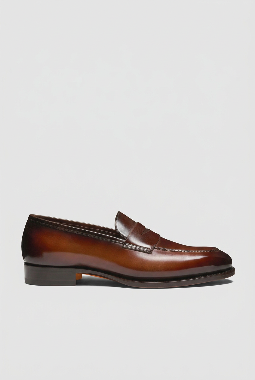 Brown loafer swap preserving the boot image’s background and ground level