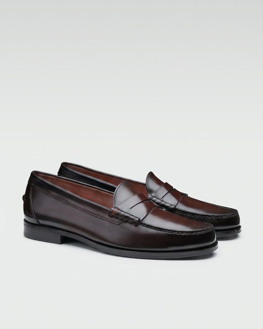 Penny loafer pair swap preserving the boot image’s background and ground level