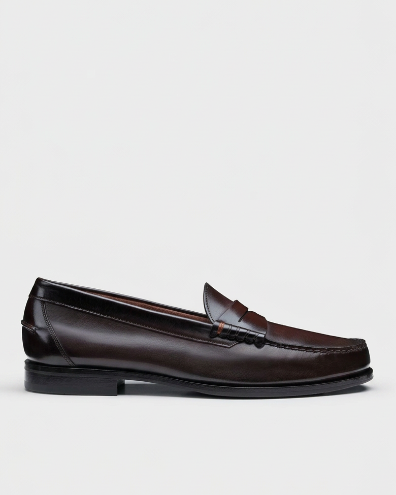 Penny loafer swap preserving the boot image’s background and ground level