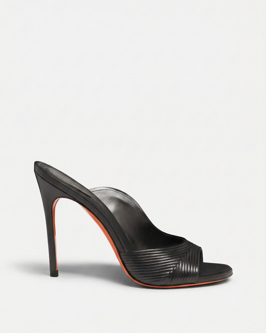 Revised black mule swap with the approved pale background and lower baseline