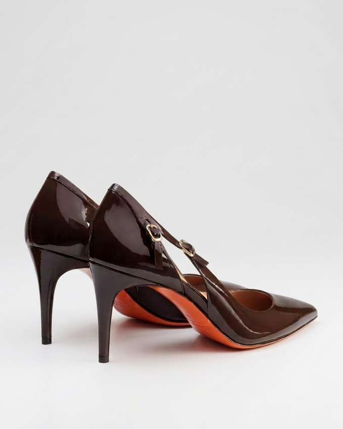 Santoni heels on an almost-white seamless grey studio background